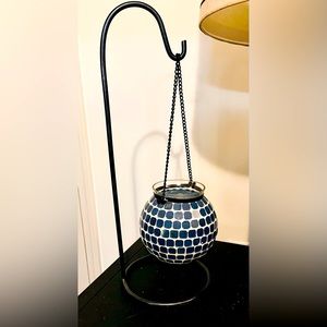 Blue glass mosaic lantern with rod iron stand